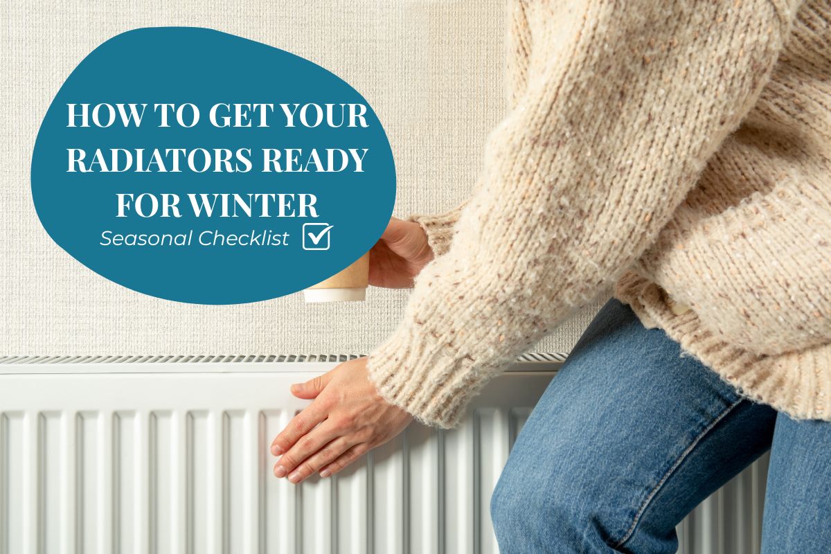 Woman checking the warmth of a radiator