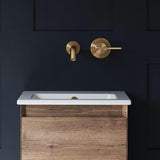 Saneux Wall Mounted Basin Tap Saneux Cos Wall Mounted 2 Hole Basin Mixer Tap in Brushed Brass