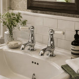 Sagittarius Pillar Basin Tap Sagittarius Kensington Lever Basin Pillar Taps (Pair) in Chrome/White