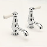 Sagittarius Pillar Basin Tap Sagittarius Kensington Lever Basin Pillar Taps (Pair) in Chrome/White